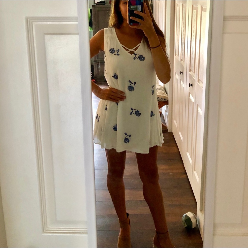 vestique white dress with flower detail